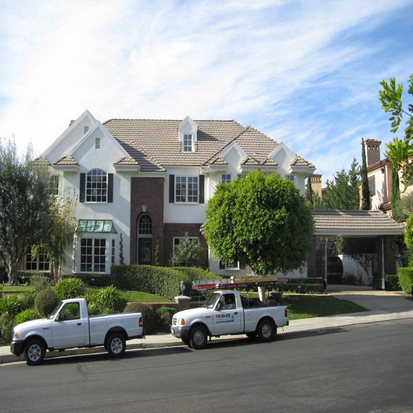 After roof cleaning photo showing cleaned residential tile roof